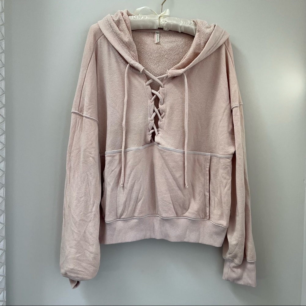 Free People pale pink sweatshirt.